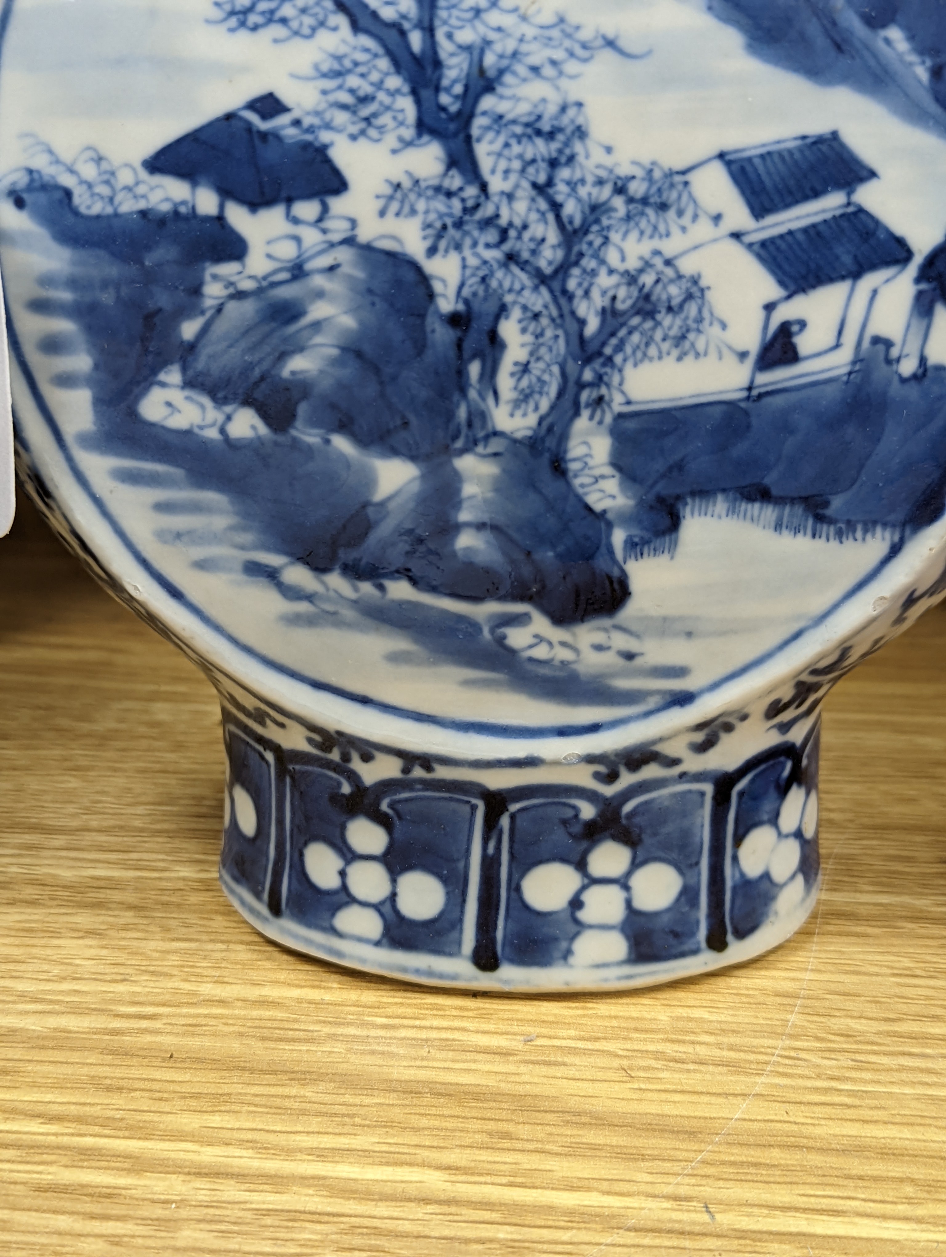 Three 19th century Chinese blue and white Moon flasks, tallest 31 cms.